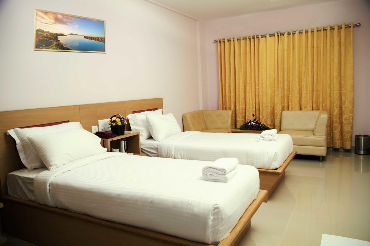 Hotel Rainbow Suites Kannur Exterior photo